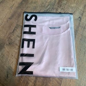 Light pink silk like shirt sleeve top